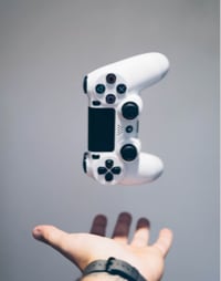 A hand with game controlle